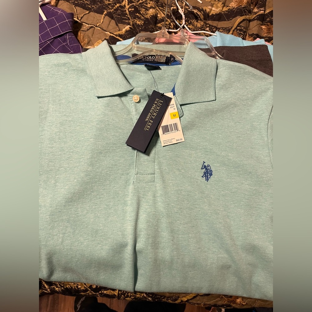 Brand new with tags never worn original soft knit polo.
